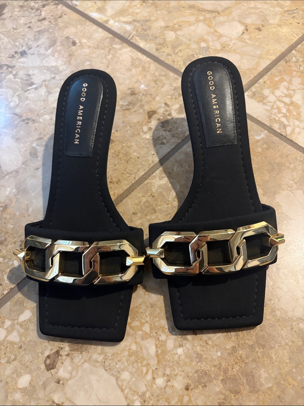 Good American Black Slide Mules with Chunky Gold Chain